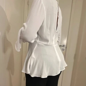  Beautiful white Top -  Only have tried it on, never worn it.