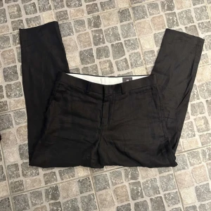 Linnebyxor från hm - Mörkblå linnebyxor från hm storlek 48