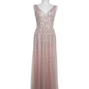 Balklänning  - En oanvänd balklänning men finns ingen prislapp kvar. Passar mig i längden och jag är 167. Väldigt fin i ryggen.