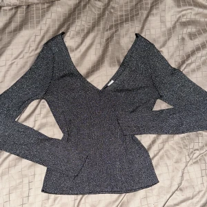 Fest topp - Glittrig fest topp från HM