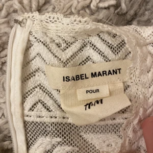 ISABEL MARANT BLUS - Nästan aldrig använt. Väldigt fin lång blus ifrån isabel marant x HM