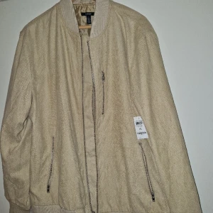 Lett jacka  XL - Ny,  oanvänd,  