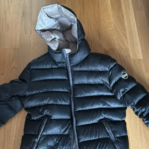 Colmar Jacka  - Colmar jacka stl xs skulle tippa på 164.  Använd men fortfarande i bra skick som 