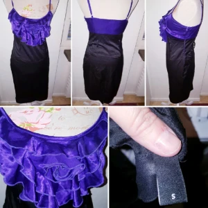Klänning i svart å lila - Storlek 38, svart å lila. En riktig partyklänning.
