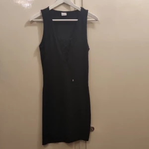 Klänning  - Klänning storlek M.