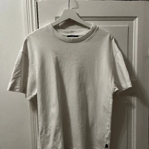 Oversized t-shirt - Sitter bra och är oversized