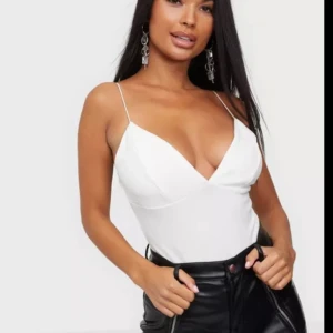 Bodysuit  Nelly storlek s - Aldrig använd , prislapp finns kvar  