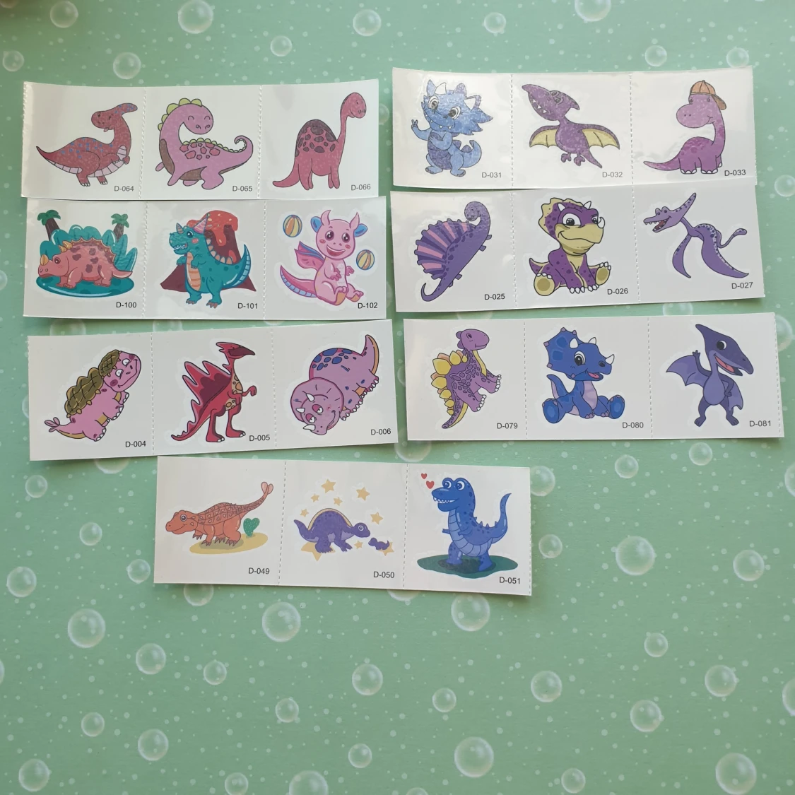 7st lila dinosaurier tatuering  - 90