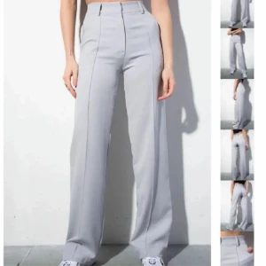 Kostymbyxor - Ljusgråa kostymbyxor från madlady, använda men i bra skick, storlek xs längd 30(short)