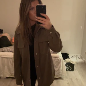 Brun kappa - Fin kappa men kommer inte längre till användning. 