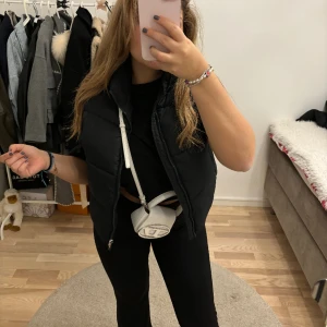 Dunväst - Dunväst från lager 157 använd en gång 