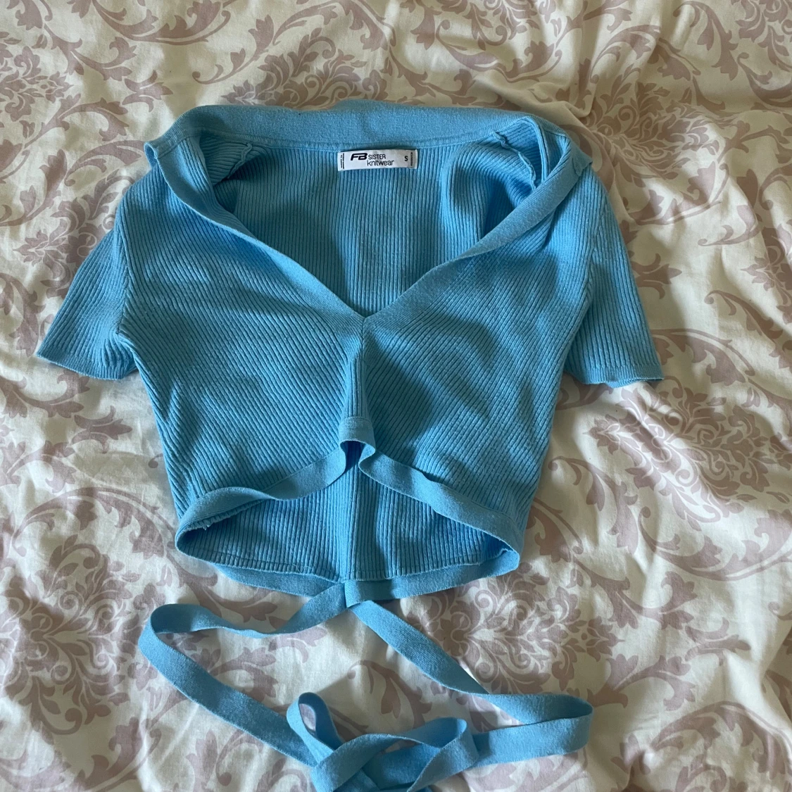 Blå topp ifrån new yorker