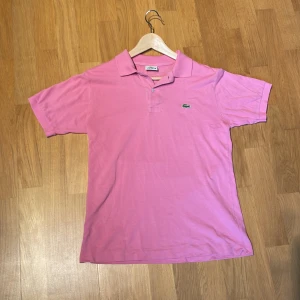 Piké  - Säljer nu denna ljusrosa piké som inte kommer till användning. Skicket är 10/10. Storlek s men passar m