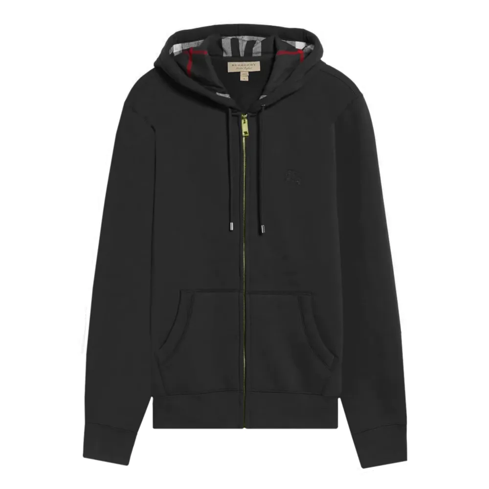 En Burberry zip hoodie som jag säljes för  passar inte min stil längre. Köpte den för 5645kr Den har inga skador . Hoodies.