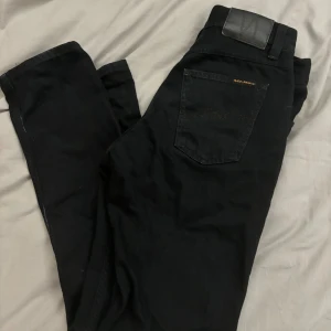Nudie Jeans svarta  - 29/32