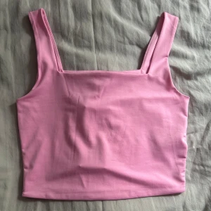 Rosa topp - En fin rosa topp, helt oanvänd med lappen kvar. Storlek L. 