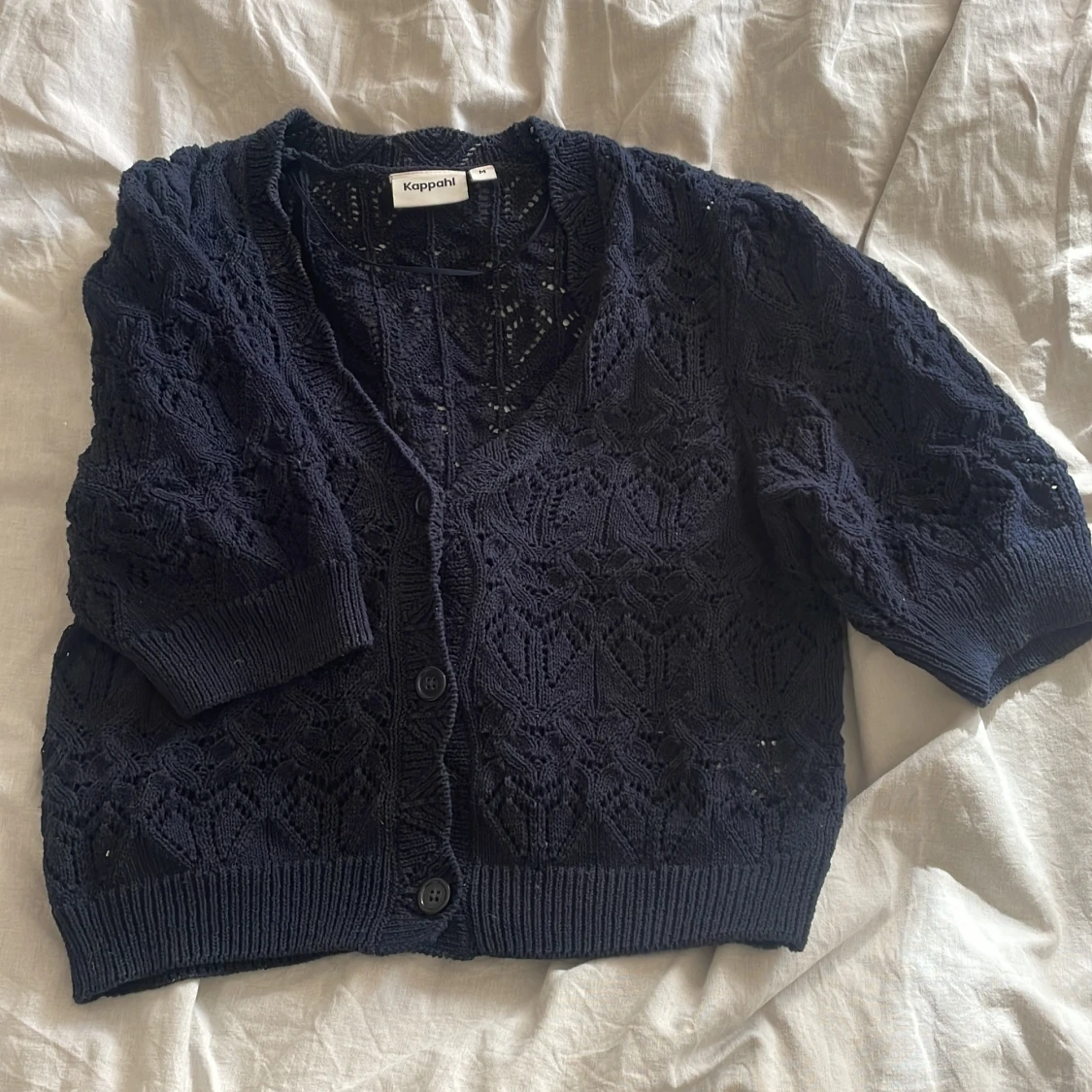 Mörkblå stickad kofta från Kappahl