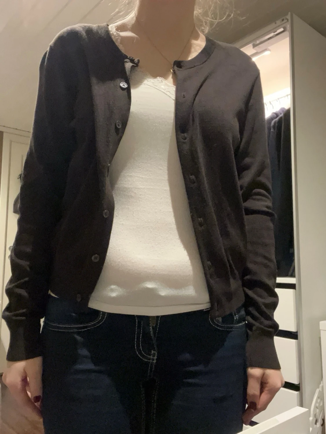 Brun kofta med knappar