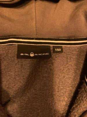 Sailracing hoodie - Strl 150 (barn/ungdom), bra skick, grå. 
