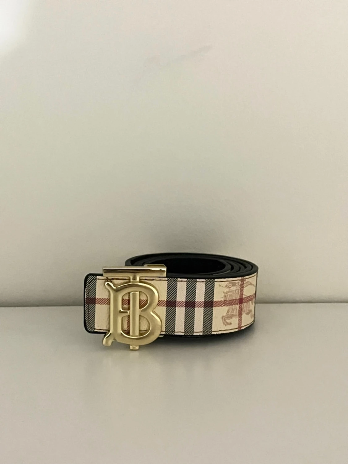 Vändbart Burberry bälte