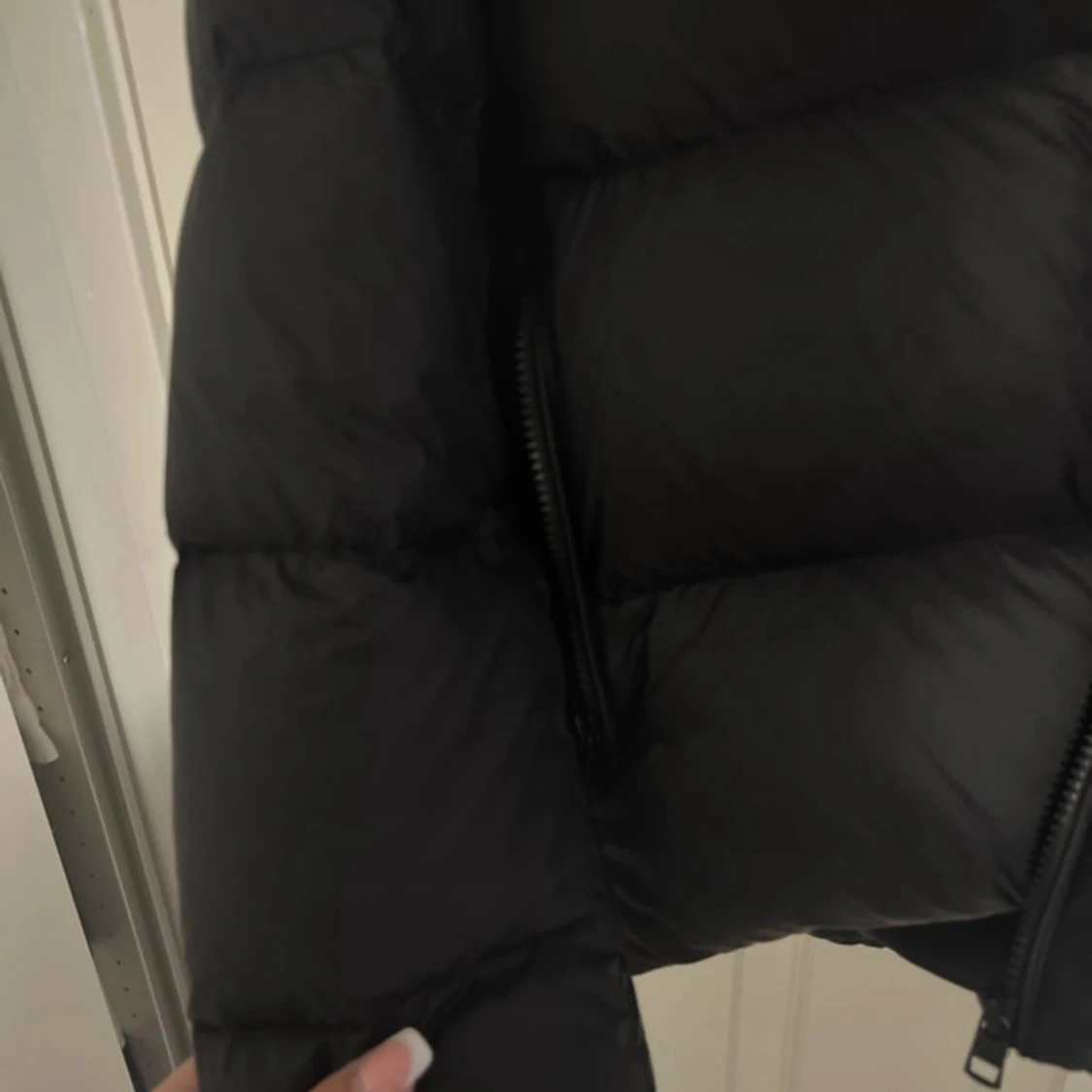 Svart pufferjacka från Calvin Klein - 1