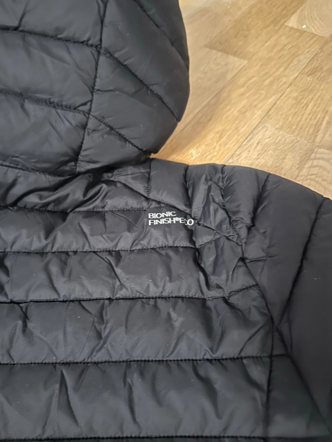 Svart quiltad pufferjacka med huva stl L  - 3