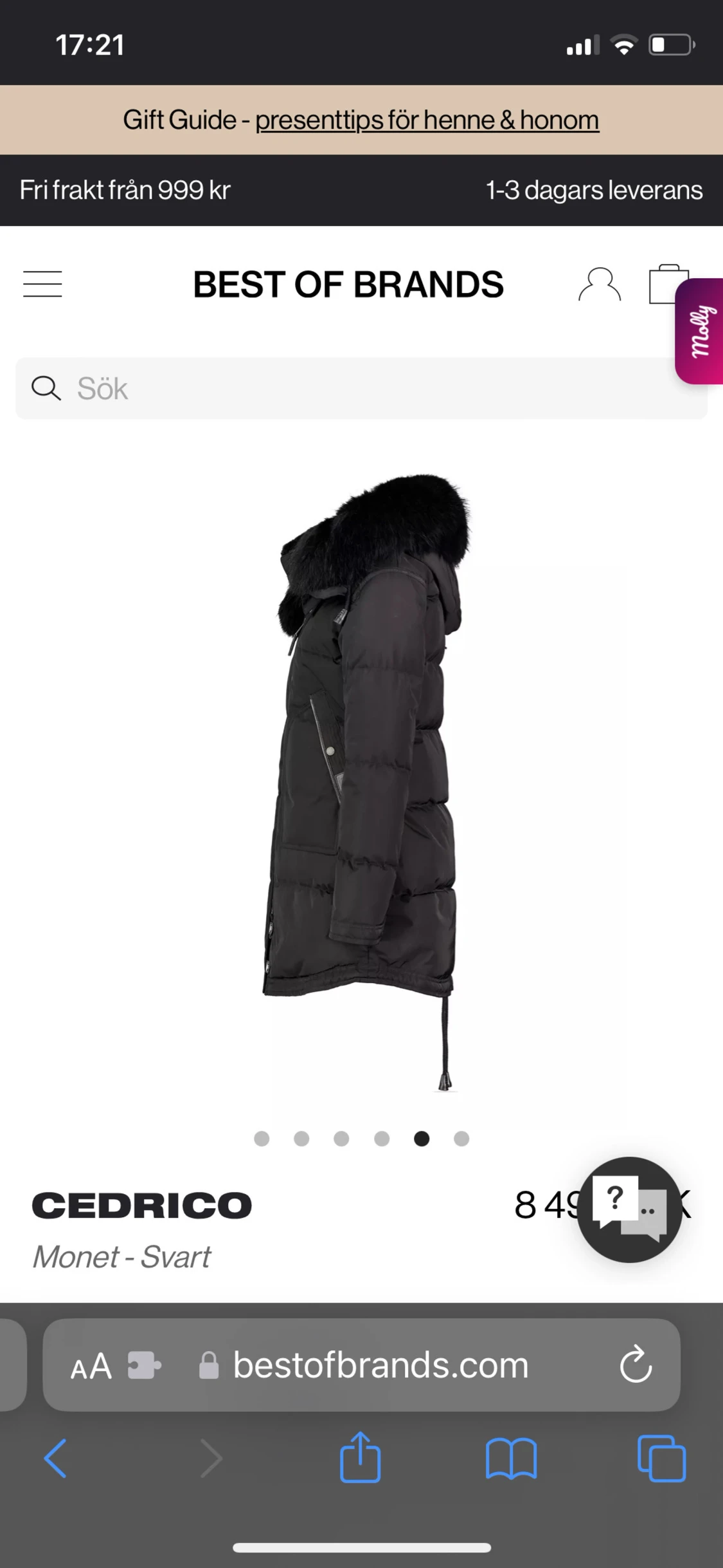 Svart pufferjacka med fuskpäls från Cedrico - 1