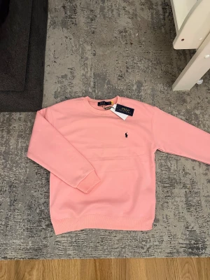 rosa Polo tröja - Aldrig använt, helt ny. 1-2 leveransdagar. 