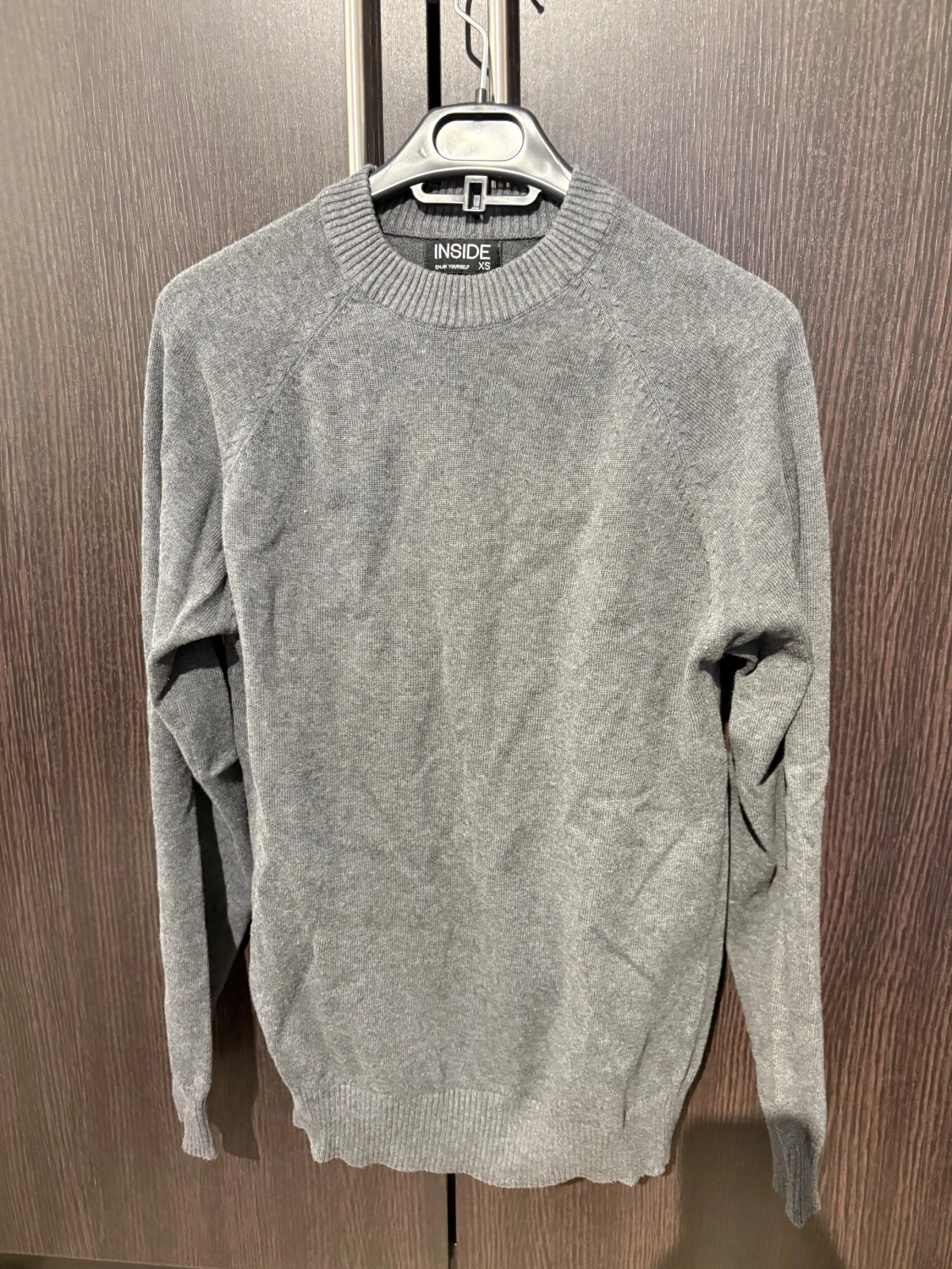 Grå stickad tröja från INSIDE