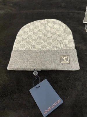 Rutig mössa VL - Mössa grå 