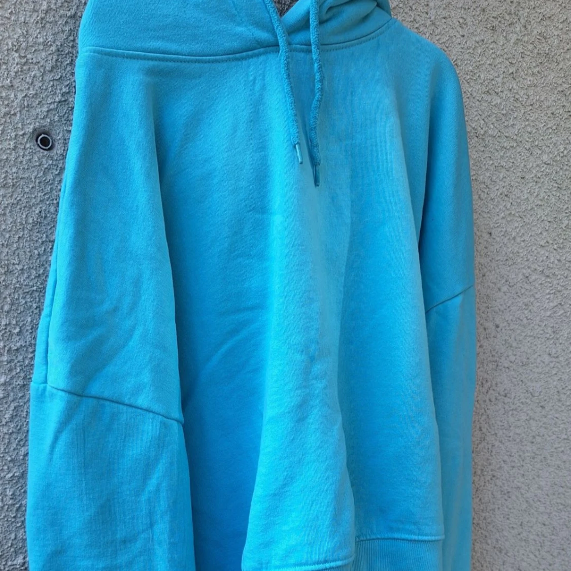 Blå oversized hoodie med huva