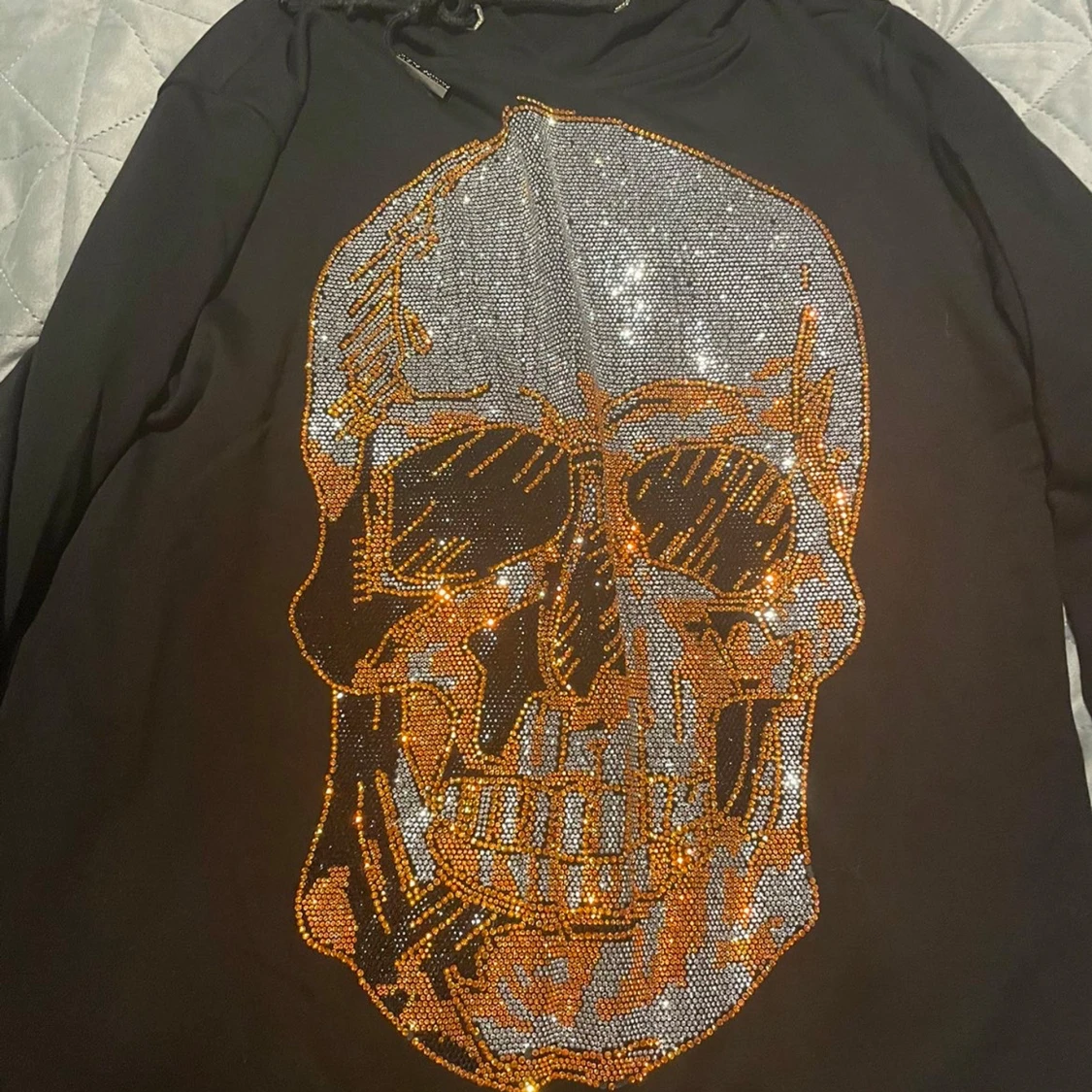 Svart hoodie med döskalle från Philipp Plein