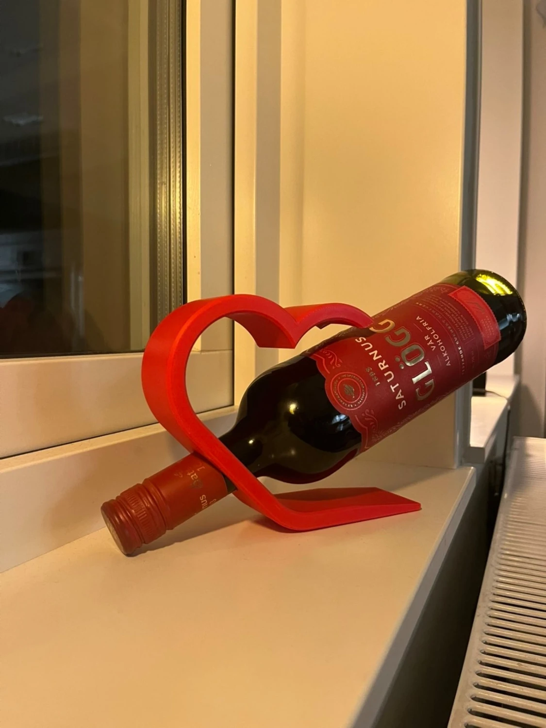 Hjärtformad vinflaskhållare – kärlek vid varje servering 