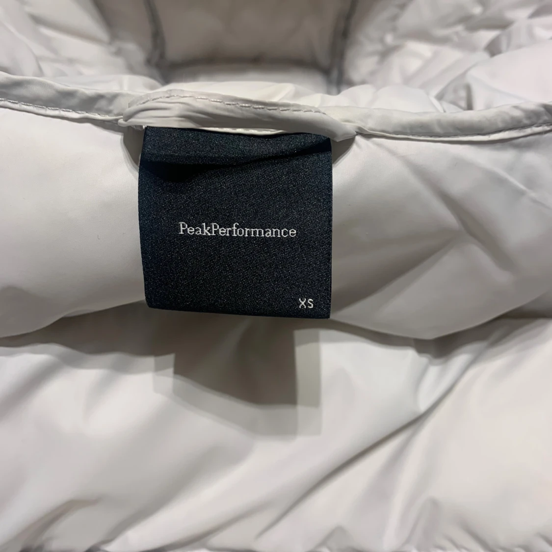 Ljusgrå dunjacka Peak Performance XS - 3