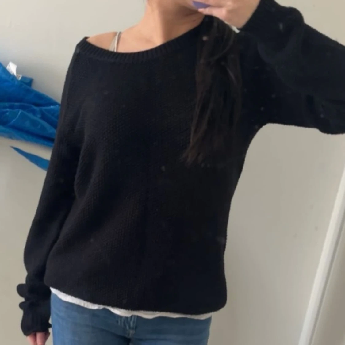 Svart stickad Långarmad