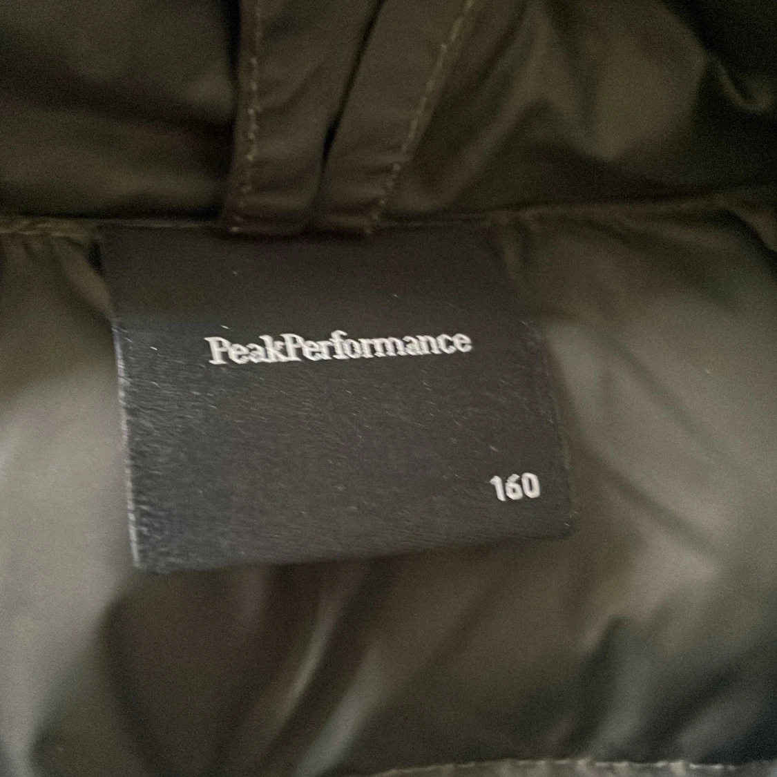 Mörkgrön dunjacka Peak Performance (160) - 2