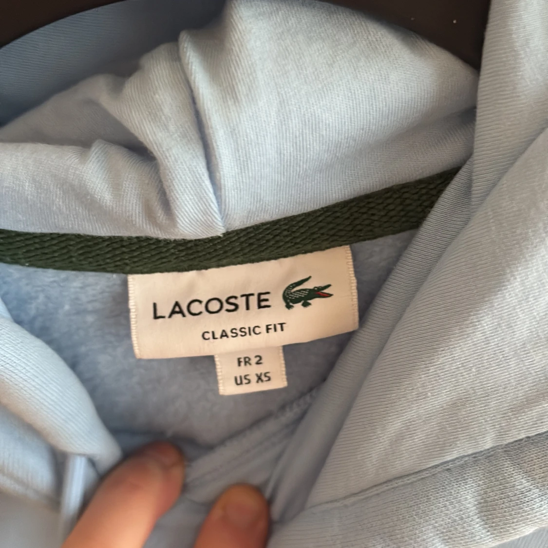 Ljusblå hoodie från Lacoste XS - 1