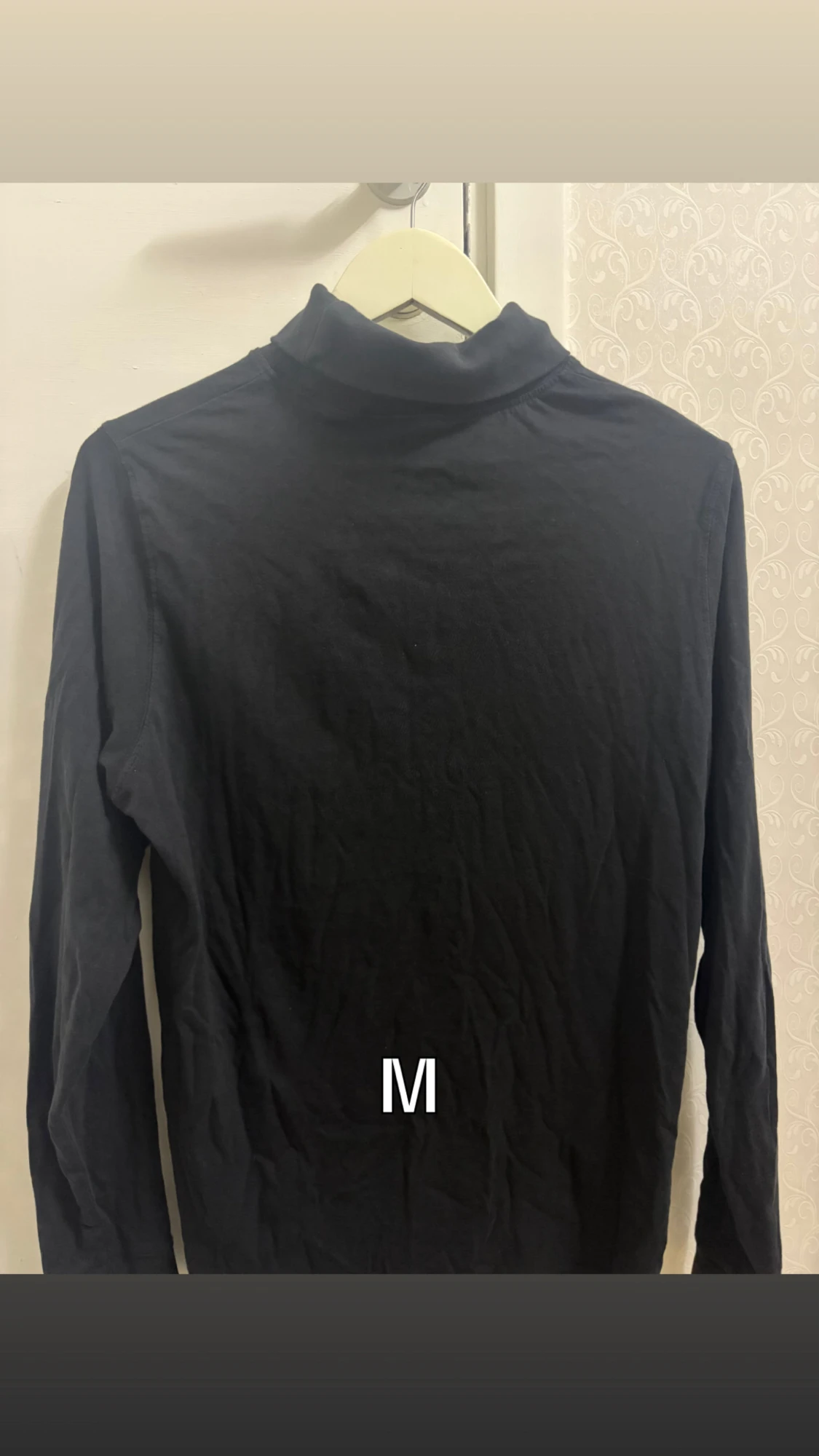 Svart polotröja, stl M