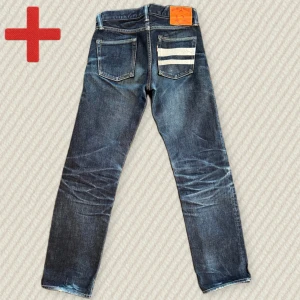 Selvedge Momotaro GTB Straight  - Ett par riktigt snygga Momotaro Selvedge jeans i storlek 28/30. FIn patina och riktigt bra skick. Skriv om du har frågor! Mått: Midja – 37 cm, Lår – 25 cm, Innersöm – 76,5 cm, Yttersöm – 98 cm, Benöppning – 18 cm