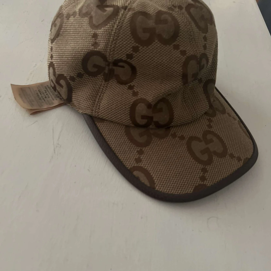 Beige keps från ggi med GG-mönster - 2