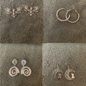 Mix av sex par coola örhängen - Säljer ett set med sex par unika örhängen i silverfärg. Inkluderar fjärilar med detaljer, klassiska hoops, spiralformade örhängen, månar med kattmotiv, chunky halvcirklar och långa örhängen med stjärnliknande former. Perfekt för dig som vill variera din stil och sticka ut. En säljs för 30kr, om man köper flera kan jag skicka dom i samma paket alltså bara en fraktkostnad. Skriv vid frågor!