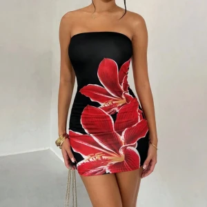 Klänning  - Jätte fin klänning med Hawaii tema. Storlek petite XXS funkar xs också 