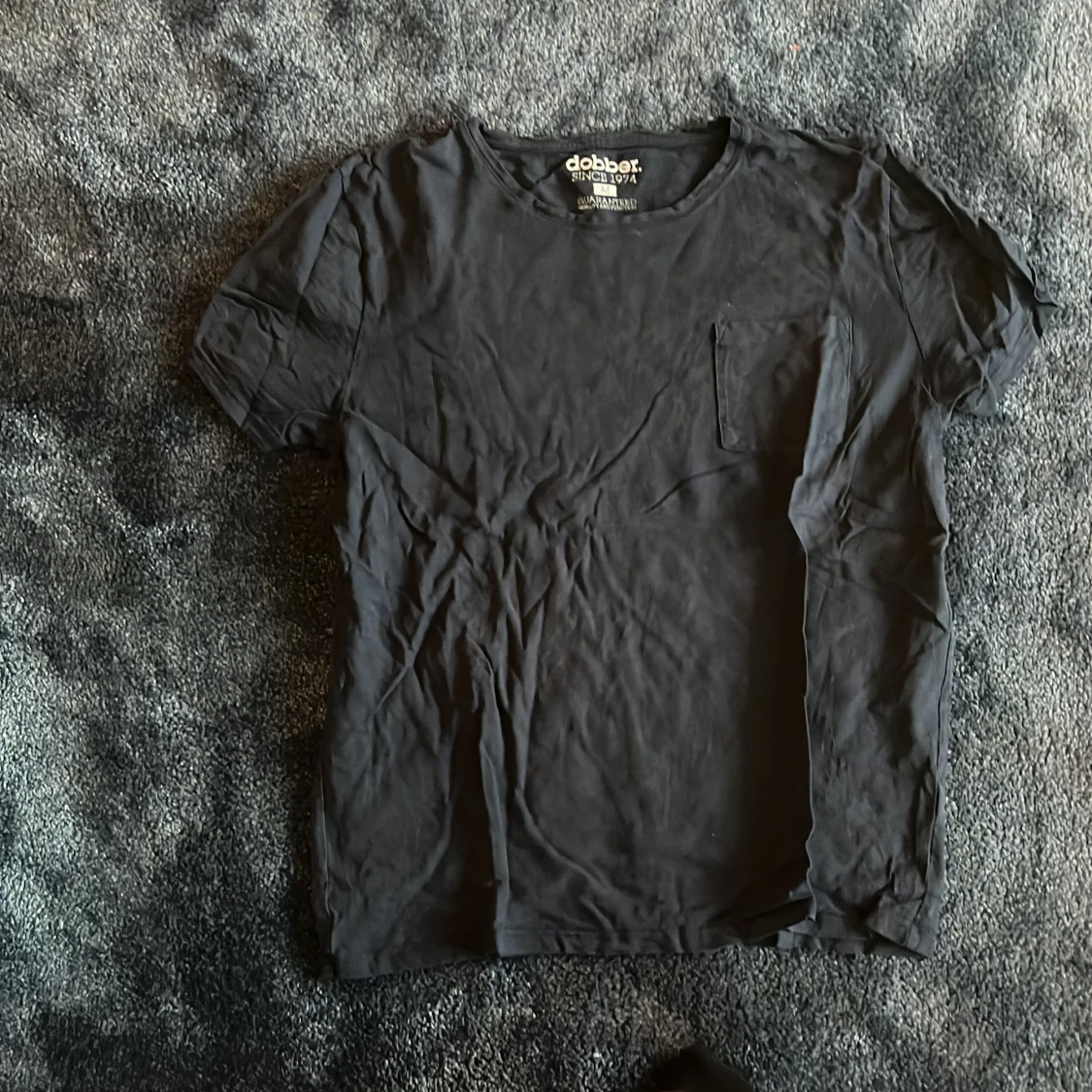 Svart t-shirt från Dobber, storlek M