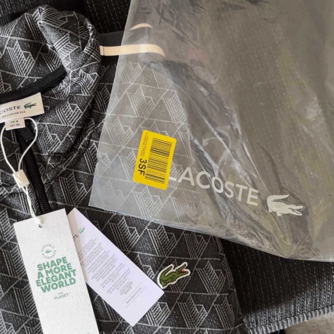 Grå mönstrad ziptröja från Lacoste - 2