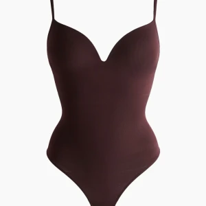 Populär body hm - Den populära bodyn fårn hm i brun/vinröd💕 Lappen kvar storlek S, säljer för det var fel storlek!