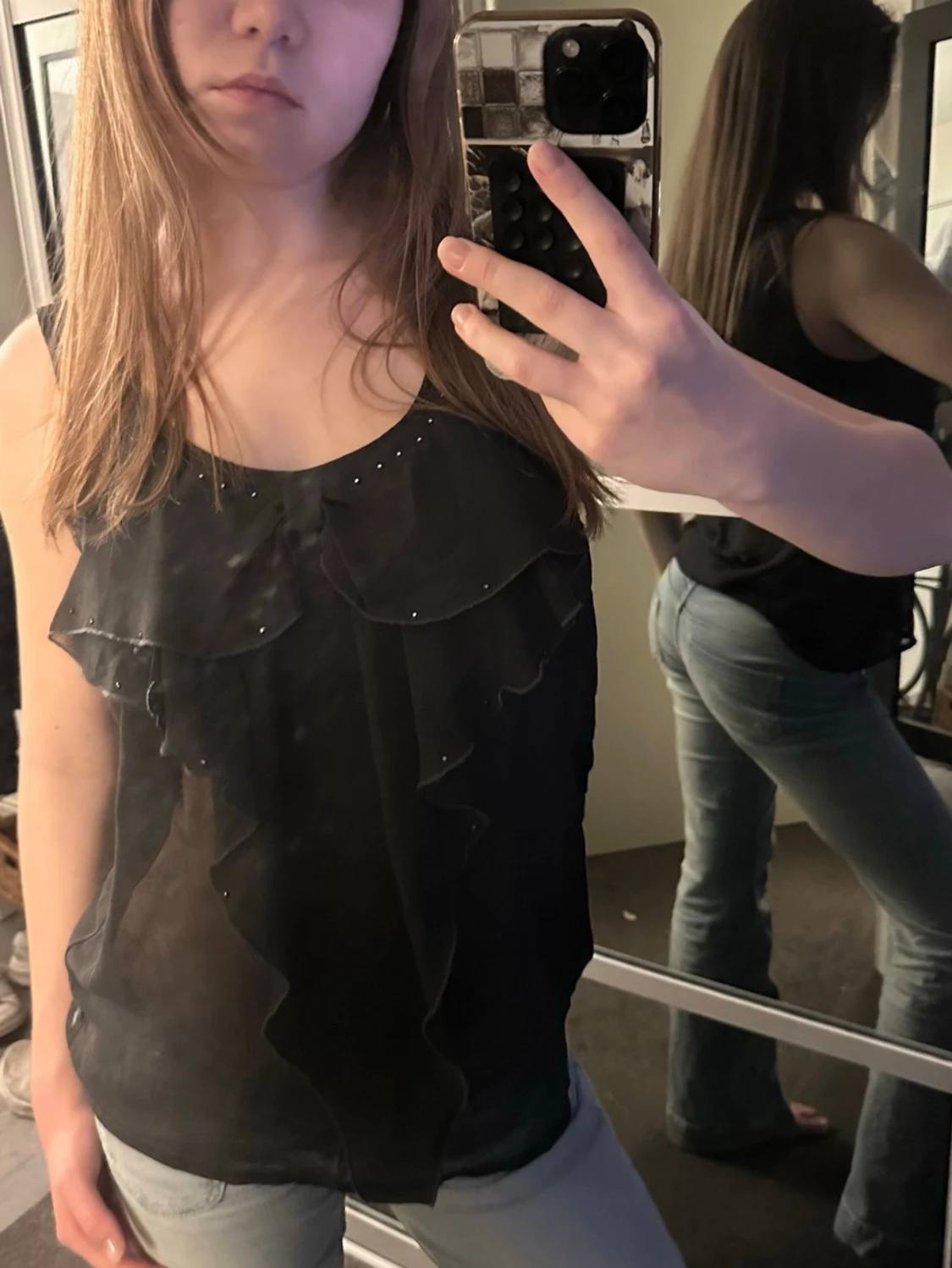 Svart volangig linnetopp - 1