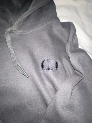 Svart hoodie CD - Svart hoodie helt ny utan prislapp 
