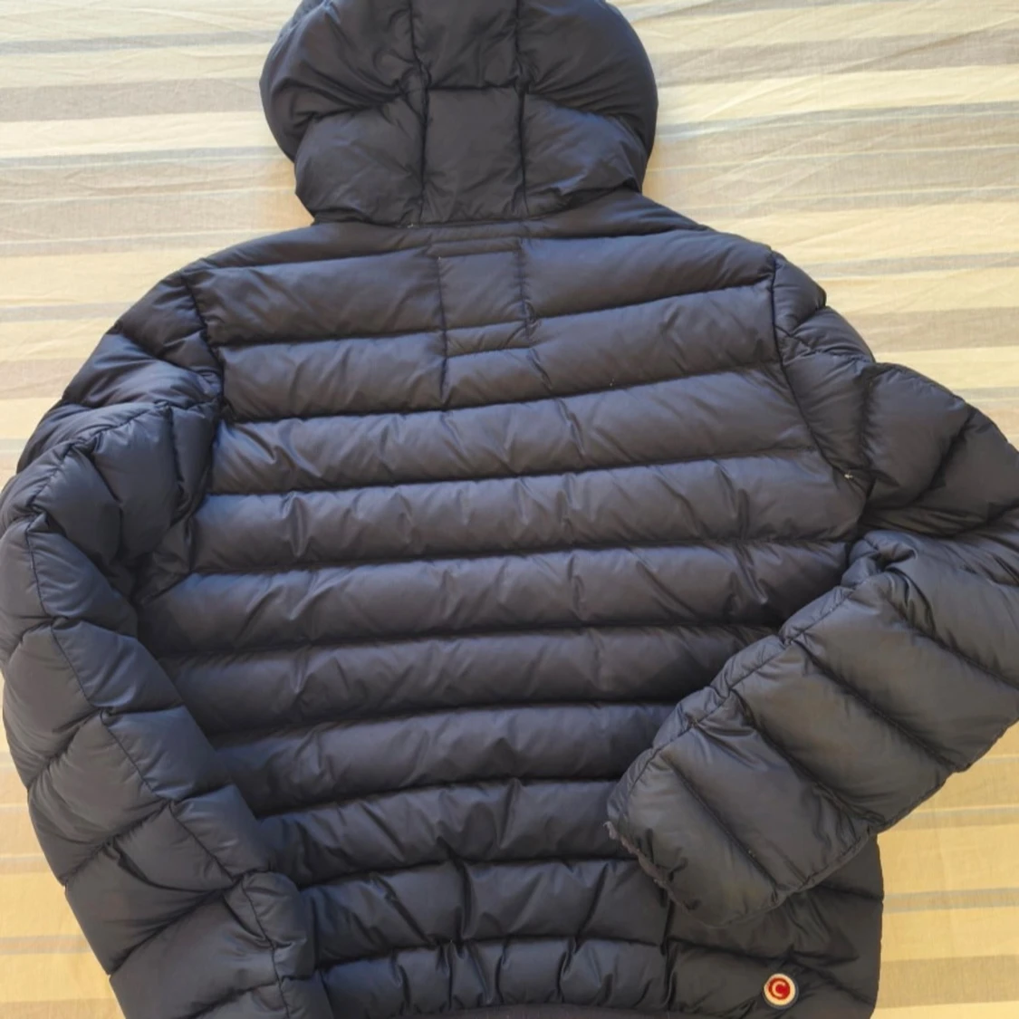 Mörkblå Colmar pufferjacka med huva - 1