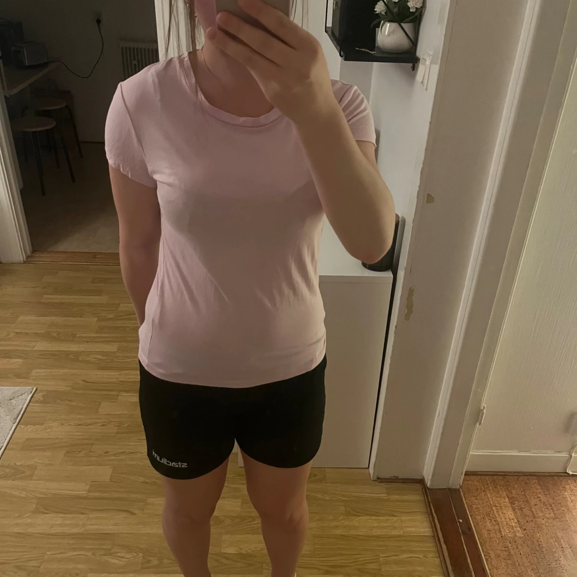 Ljusrosa t-shirt från Gina Tricot