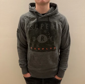 Superdry Hoodie - - Condition: 8/10 - Color: Gray - Size: L/M